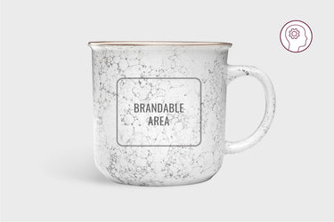 Speckled white ceramic mug with a black marbled pattern, and a brandable area